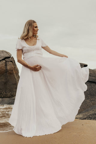 Coven & Co Halo Gown: Maternity Dress Hire - Deep Plunge V-Neckline Maternity photoshoot dress