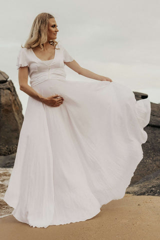 Coven & Co Halo Gown: Maternity Dress Hire - Deep Plunge V-Neckline Maternity photoshoot dress