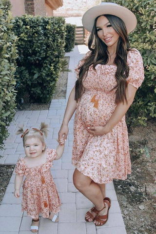 Coven & Co Posie Mini Dress: Maternity Dress Hire - Petite Dress Hire Australia - Maternity Photoshoot Dress for Petite Ladies - Petite Lady Dress Australia - Maternity and Beyond Dress Hire - Nursing Friendly Dress - Peach Dress Hire - Floral Dress Hire for Petite Ladies