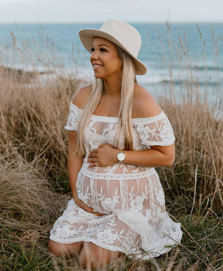 Bump-friendly lace maternity dress hire - Coven & Co Raven Cold Shoulder Dress for photo shoots and baby showers.