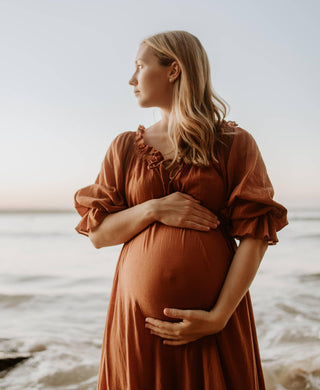 Capture stunning photos with this romantic maternity dress hire - Hazel & Folk Emmaline Maxi Gown - Cinnamon