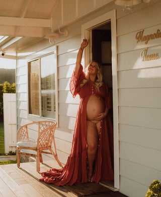 We Are Reclamation Ruffle Me Open Gown Rust - Rent this Beautiful Maternity Dress