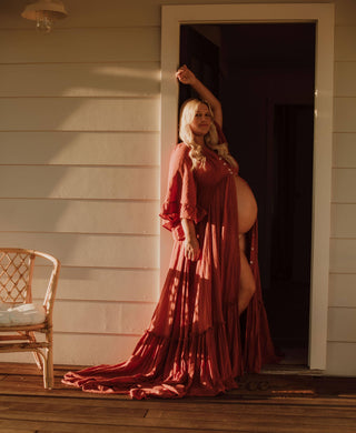 Show off Your Bump - Reclamation Ruffle Me Open Gown Rust Maternity Dress Hiren Rust at her maternity photoshoot.