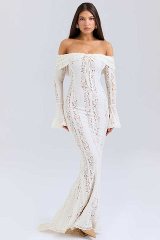 A model wearing the House of CB Belle Vintage Cream Floral Lace Off Shoulder Maxi Dress