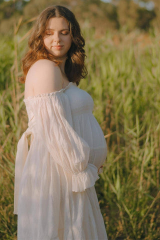Soft ivory maternity dress hire - Bird and Kite Isabella Dress available in sizes XS to XL.
