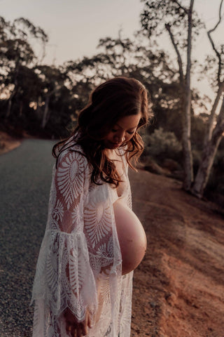 Beautiful pregnant lady wears the Co and Ry Everly Wrap dressMaternity Dress Hire - Co and Ry Everly Wrap Dress - Elegant attire for maternity photoshoot, baby showers and events, pair it with our maternity slips for added coverage.