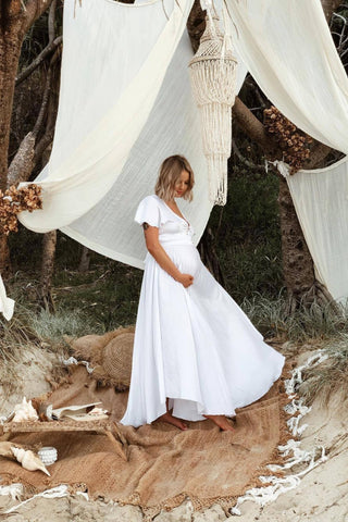 Sheer Elegant Maternity Dress Hire for Photoshoots and Baby Shower: Coven & Co Halo Gown