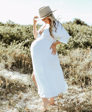 Maternity Dress Hire - White Maxi Dress - Deep V Neckline - Elastic Waist - Centre Front Split - Sizes S to XL - Girl And The Sun Verity Maxi Dress