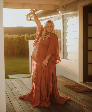 Maternity Dress Hire - We Are Reclamation Ruffle Me Open Gown - Rust - Linen gauze gown with elasticated waist and shoulders, buttons all the way down the front for a bump-friendly look.