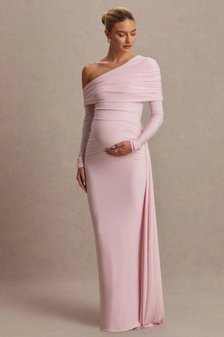 A pregnant lady wearing the Mama Rentals Club L London Amara Maternity Maxi with Sash in pink against a plain background