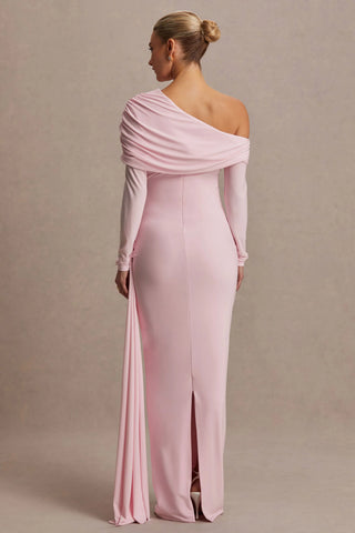 A pregnant lady showing the back design of the Mama Rentals Club L London Amara Maternity Maxi with Sash in pink against a beige background.