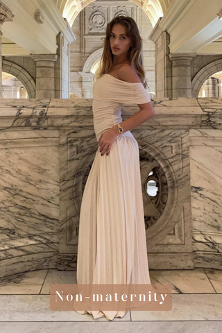 A non-pregnant lady wearing the Lioness Field of Dreams Maxi Dress - Oatmeal.